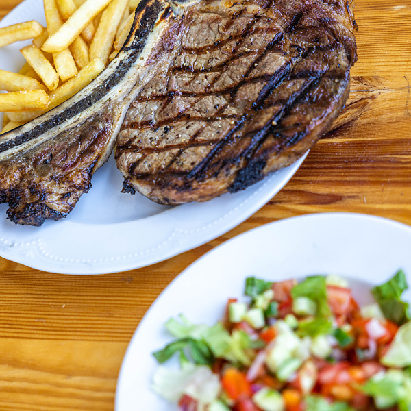 a-dish-served-steak-on-bone